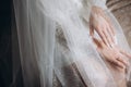 Horizontal images of ÃÂloseup of elegant and beautiful hands of bride with wedding ring on fingers.